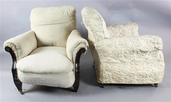 A pair of early 20th century mahogany club armchairs